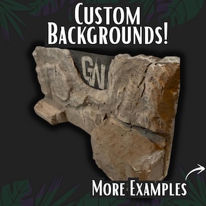 May include: A custom background prop with a rock-like appearance. The prop is a light brown color with darker accents, and the text "Custom Backgrounds!" is displayed at the top. The letters "GN" are visible on the prop. The words "More Examples" are at the bottom.