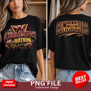May include: A black t-shirt featuring a graphic design on the front and back. The front displays the text COMMANDERS NATION with a football helmet and a football. The back features the word COMMANDERS in large burgundy and gold lettering.