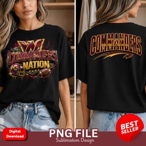 May include: A black t-shirt featuring a graphic design on the front and back. The front displays the text COMMANDERS NATION with a football helmet and a football. The back features the word COMMANDERS in large burgundy and gold lettering.