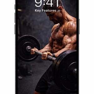 May include: Black smartphone screen showing a person lifting a barbell in a gym. The time 9:41 and the words "Key Features" are displayed. The phone's screen displays a dark image.