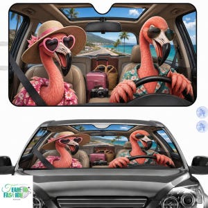May include: Car sunshade featuring a whimsical design of two pink flamingos in a car, wearing sunglasses and hats, with a beach scene visible through the windshield. The flamingos are dressed in vacation attire.