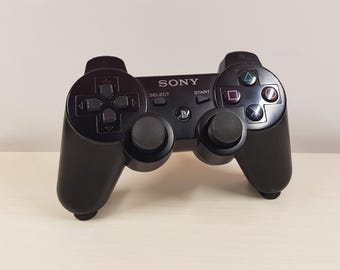 Soporte de pared invisible para mando de Sony Playstation 3, organizador de configuración de juegos, color negro.