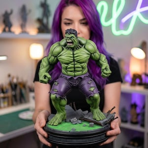 May include: A set of three ceramic mugs with a speckled, matte finish in cream, light grey, and dark grey. Each mug has a simple, minimalist design, suitable for coffee or tea.