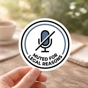 May include: A round sticker with a black and blue design. The sticker features a microphone icon with a line through it, inside a blue and black circle. The text "MUTED FOR LEGAL REASONS" is printed around the circle.