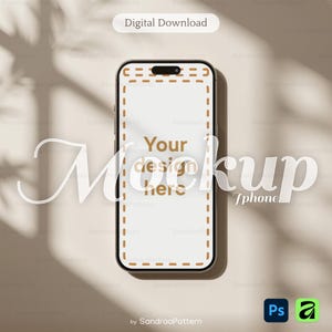 Op de afbeelding: Een mockup van een zwarte smartphone met een leeg scherm met de tekst "Your design here". De telefoon staat tegen een neutrale achtergrond met zachte schaduwen. Boven staat "Digital Download".