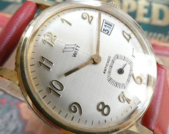 1970s French WITT Dress Watch: Linen Textured Dial, Roman Numerals, Mechanical Movement