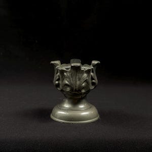 Patinated tin candlestick – Art Nouveau style – Sculpted candlestick – Floral decoration – Antique item