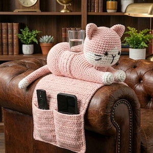 May include: A set of three ceramic mugs with a speckled, matte finish. The mugs are in shades of cream, light gray, and dark gray. Each mug has a simple, modern design and a rounded handle. Perfect for coffee or tea.