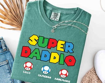 Comfort Colors Super Daddio Shirt, Gamer Dad Shirt, Personalized Dad Tee, Custom Kids Names Shirt, Father’s Day Gift, Gaming Dad Shirt