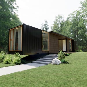 May include: A modern, black container home with large windows and a wooden accent wall. The house is set on a grassy hill with a concrete walkway leading to the entrance. Lush green trees surround the home.