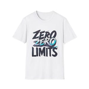 May include: White t-shirt with the text "ZERO ZERO LIMITS" in a stylized, gradient design. The text is primarily dark blue with teal and white accents. The shirt has a crew neck and short sleeves.