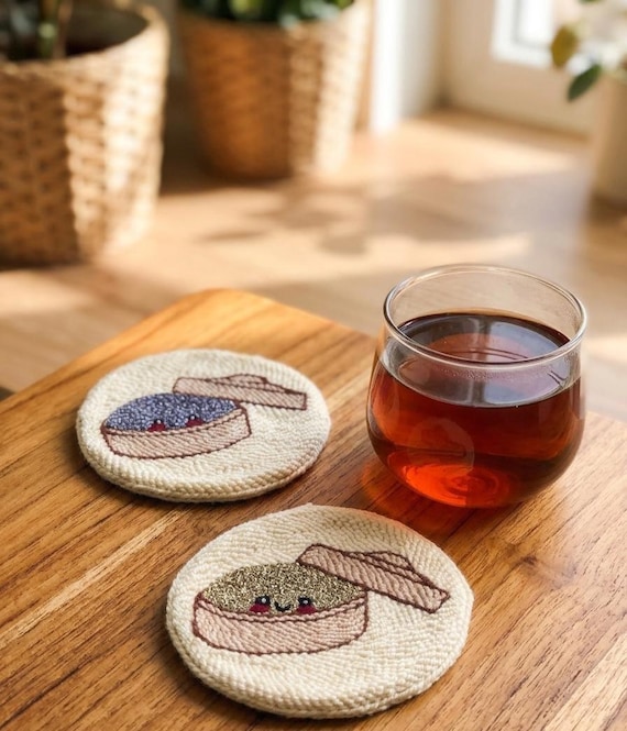 Punch-needle squishy dim sum coasters that look good enough to eat — genuinely tactile, kawaii, and unlike anything mass-produced.