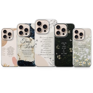 May include: Five smartphone cases arranged in a row, each featuring unique designs with religious text. The cases display various aesthetics including marble patterns, floral illustrations, and dark botanical prints with white script lettering.