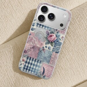 May include: A clear phone case with a patchwork design featuring floral and gingham patterns in shades of pink, blue, and white. The case has a clear border and a silver camera module.