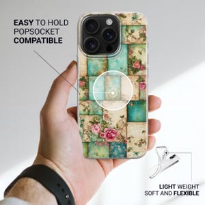 May include: Clear phone case with a floral design featuring pink roses and teal squares. The case is labelled "EASY TO HOLD POPSOCKET COMPATIBLE" and "LIGHT WEIGHT SOFT AND FLEXIBLE".