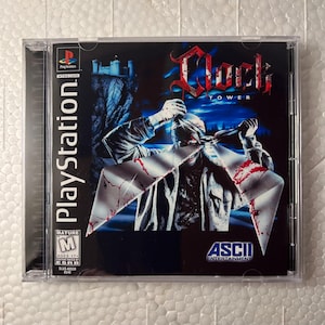 May include: A PlayStation game case for "Clock Tower." The cover art features a menacing figure with a knife, a castle, and the game's title in a gothic font. The case is in a clear plastic sleeve.
