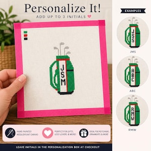 May include: A hand-painted needlepoint canvas with a pink border features a green golf bag design. The bag includes the initials "JSM" and is surrounded by the text "Personalize It!" and "Add up to 3 Initials". Examples of initials are shown.