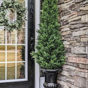 May include: A set of three ceramic mugs with a speckled, matte finish. The mugs are in shades of cream, light gray, and dark gray. Each mug has a simple, minimalist design, perfect for coffee or tea.