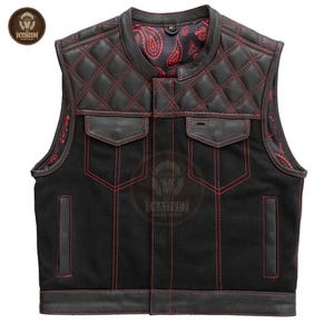 May include: Black leather vest with red stitching and quilted shoulder panels. Features two front pockets and a paisley patterned lining. The vest has a Native Leather Jackets logo patch.