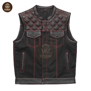 May include: Black leather vest with red stitching and diamond-quilted shoulder panels. Features two front pockets and a Native Leather Jackets logo. The vest has a classic, rugged design.