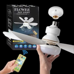 May include: A white ceiling fan light with a standard E27 screw base, featuring multiple blades and an integrated LED light source. The product is shown with its black retail packaging box and a handheld remote control with various buttons.