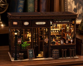 May include: A miniature wooden tavern model with intricate details. The facade features a sign that reads "The Hidden Tavern - In The Corner." The interior is lit, showcasing shelves of bottles and glasses. A small sign reads "Tasty."