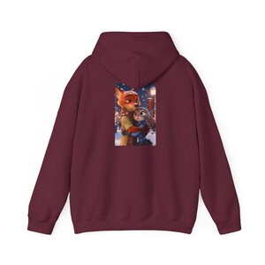 Hoodie personaliseren | Gezellige besneeuwde nachtillustratie zootopia afbeelding 6