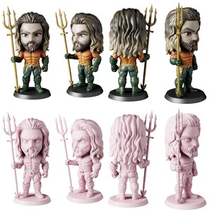 May include: A collection of Aquaman figurines in various poses. The figures are depicted in their classic costume, holding a golden trident. The top row features detailed, colored figures, while the bottom row shows pink monochromatic versions.