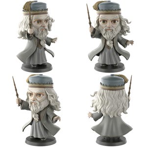 May include: A wizard figurine with a long white beard, holding a wand. The wizard is dressed in a gray robe and a matching hat with a gold tassel, standing on a black base. The image shows the figurine from various angles.