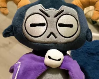Gothic Plush Doll: Spooky Cartoon Stuffed Animal with Purple Cape, Third Eye, Horns