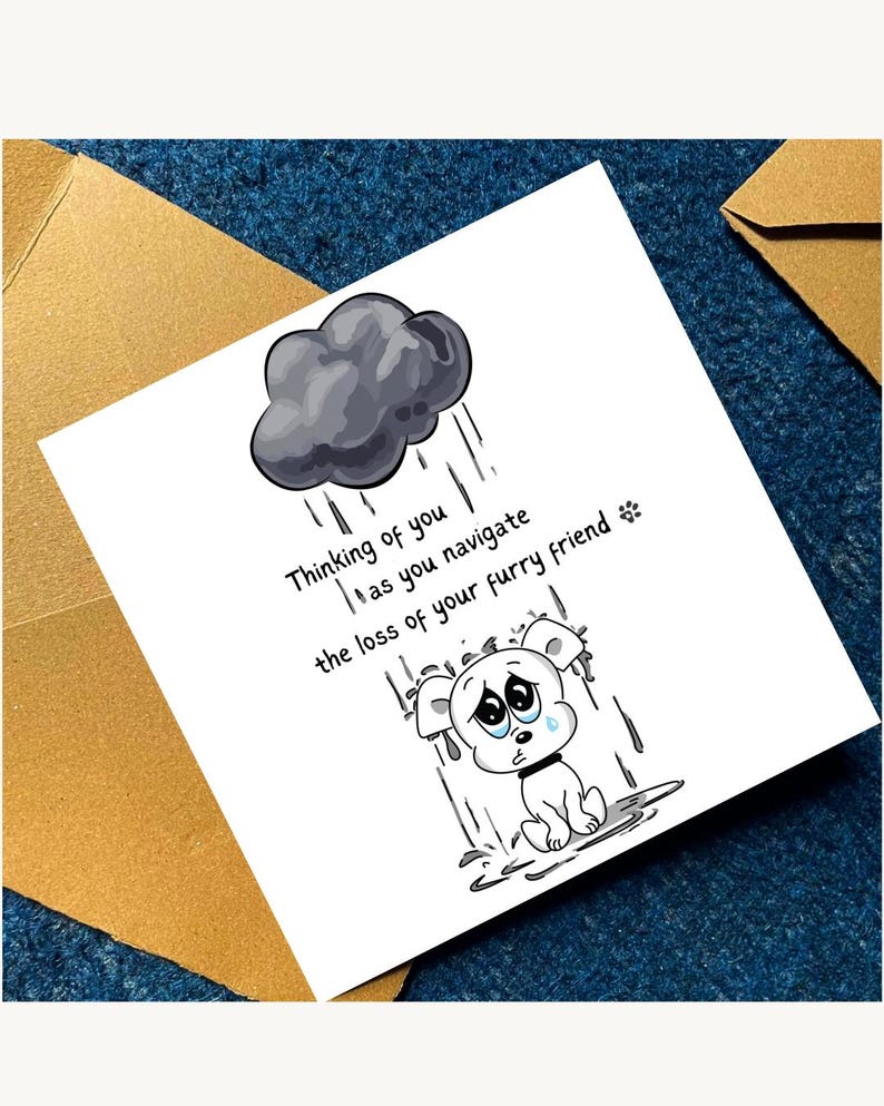 May include: A white greeting card with a cartoon illustration of a sad puppy under a rain cloud. The card includes the text: "Thinking of you as you navigate the loss of your furry friend."