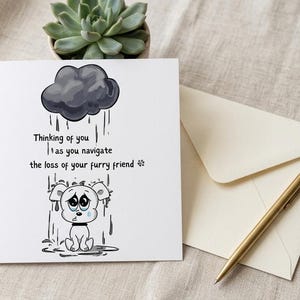 May include: A sympathy card with a cartoon dog under a rain cloud, with the text "Thinking of you as you navigate the loss of your furry friend." An envelope, pen, and small succulent are also present.
