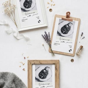 May include: Three birth announcement prints featuring a black and white photograph of a swaddled newborn. Each print displays the text "Welcoming our little prince," the name "James Oliver," the date "June 13," the time "7:45 PM," and the year "2026."
