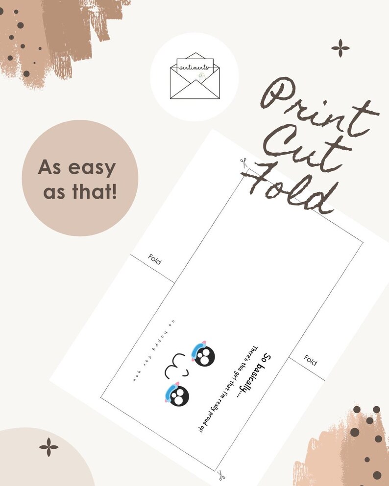May include: A white card with the text "So basically... There's this girl that I'm really proud of!" and a cartoon face. The card also has the words "Print Cut Fold" and "As easy as that!" in a handwritten font.