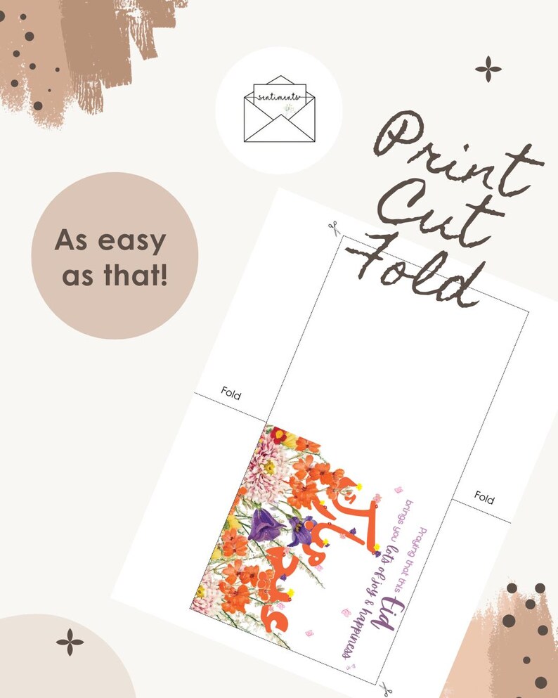 Op de afbeelding: Een witte kaart met de woorden "Print Cut Fold" in bruin script. De kaart heeft een bloemenontwerp met oranje en paarse bloemen. Tekst op de kaart luidt "As easy as that!" en "Eid".