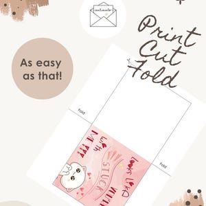 Puede incluir: Una plantilla de tarjeta imprimible con fondo rosa, una ilustraci&oacute;n de gato y el texto "Looks like you're stuck with me!!!". El dise&ntilde;o incluye l&iacute;neas discontinuas para cortar y l&iacute;neas continuas para doblar, junto con el texto "Print Cut Fold" y "As easy as that!".