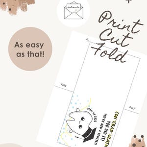 Puede incluir: Una tarjeta blanca con un diente de dibujos animados con birrete, con el texto "CON 'GRAD' ULATIONS YOU DID IT! YOU'RE NOW A DENTIST!" y "class of 2026". La tarjeta tambi&eacute;n tiene las palabras "Print Cut Fold".
