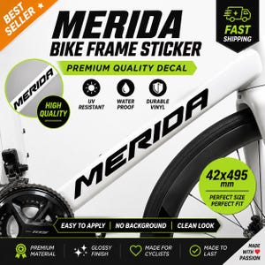 May include: A white Merida bike frame sticker with black lettering. The sticker is UV resistant, water proof, and made of durable vinyl. The sticker measures 42x495 mm and is easy to apply with a clean look.