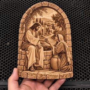 May include: A tan-coloured, arched wooden plaque featuring a detailed laser-engraved scene of a figure in robes handing a small cup to a kneeling person beside a stone well. The background depicts a landscape with trees, buildings, and a path.