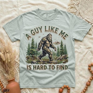 Funny Bigfoot Shirt, A Guy Like Me Is Hard to Find Tee, Sasquatch Graphic T-Shirt, Camping Humor Tee, Outdoors Lover Gift, Nature Lover Tee Bay