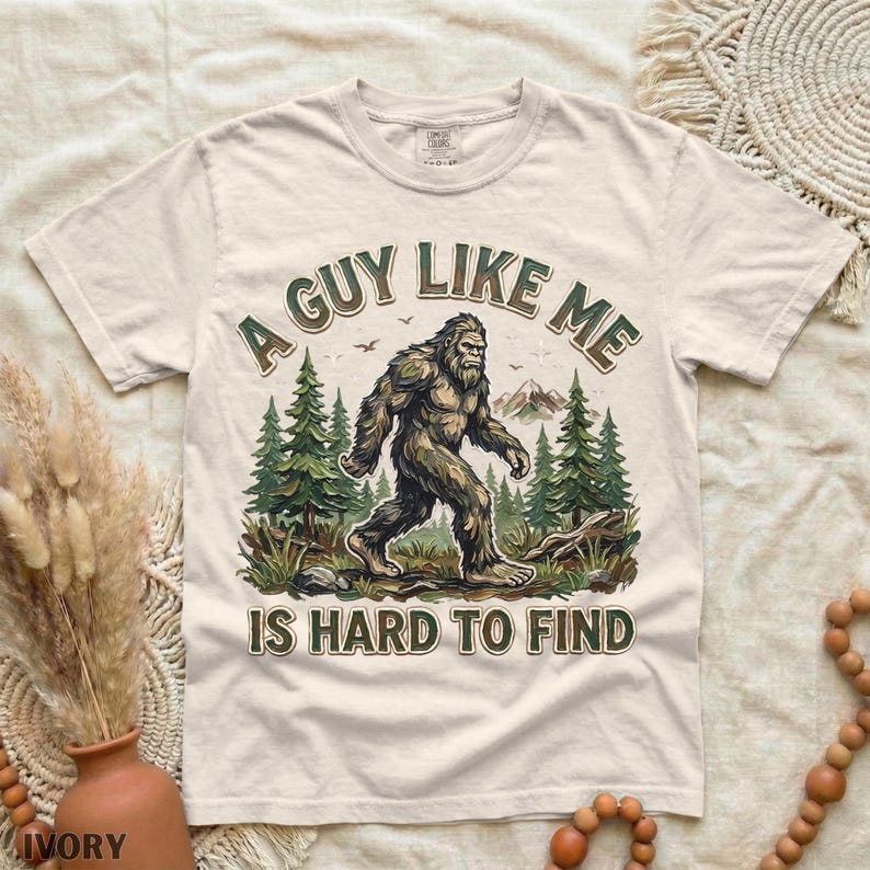 Funny Bigfoot Shirt, A Guy Like Me Is Hard to Find Tee, Sasquatch Graphic T-Shirt, Camping Humor Tee, Outdoors Lover Gift, Nature Lover Tee Ivory