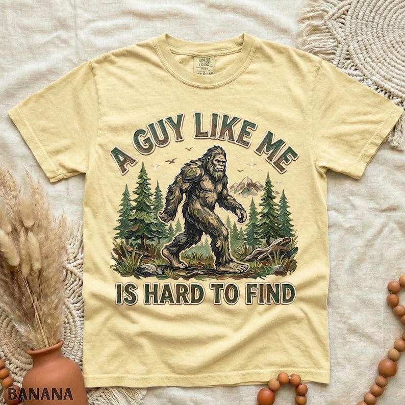 Funny Bigfoot Shirt, A Guy Like Me Is Hard to Find Tee, Sasquatch Graphic T-Shirt, Camping Humor Tee, Outdoors Lover Gift, Nature Lover Tee Banana