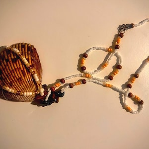 H2O inspired beaded and wire wrapped cockle shell necklace