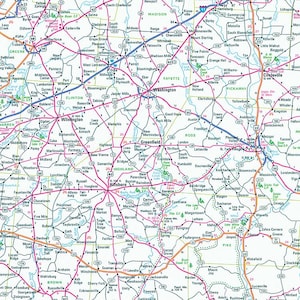 May include: A detailed road map with numerous towns and cities labeled. The map features a network of roads and highways, with a focus on the central Ohio area, including the cities of Washington and Hillsboro.