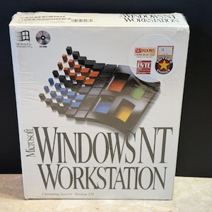 May include: A factory-sealed white box for Microsoft Windows NT Workstation version 3.51. The front features the classic Windows logo made of colored blocks, the product name in large black text, and several award stickers including Byte and Editor's Choice.