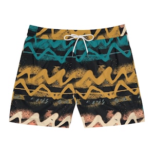 May include: Black swim trunks featuring a horizontal pattern of wavy lines in teal, mustard yellow, and light peach. The shorts have a black waistband with a white drawstring cord centered at the top, and the overall design has a spray-painted texture.