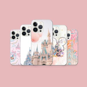 May include: Five smartphone cases with different designs, including castles, characters, and fireworks. The cases are set against a pink backdrop. The cases are designed to fit a smartphone and have a glossy finish. They are made of a durable material.