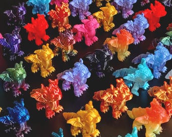 Figuritas articuladas de crías de dragón: juguetes antiestrés impresos en 3D