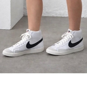 white and black nike blazers