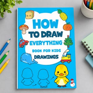 May include: A blue drawing book for kids with the text HOW TO DRAW EVERYTHING BOOK FOR KIDS DRAWINGS. The cover features colourful illustrations of a sandwich, pineapple, mushroom, pumpkin, car, tree, whale, train, duck, and snowman.